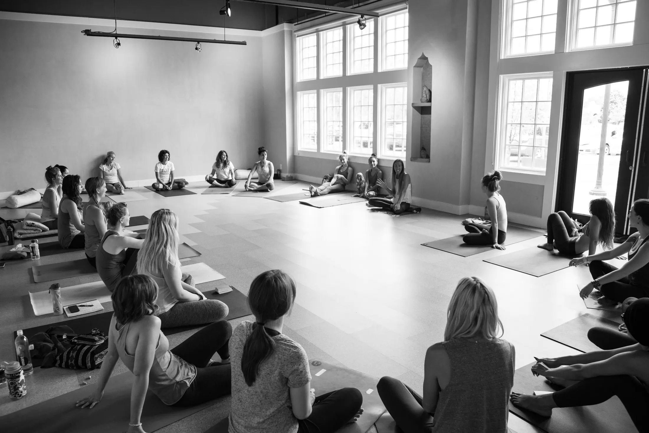 3B students sitting together in a circle in the studio